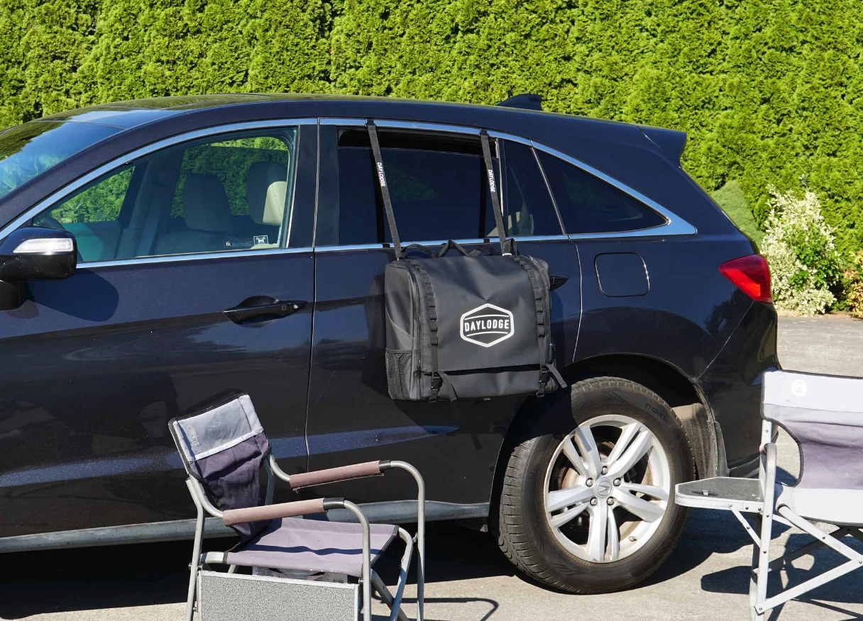 Daylodge Workspace hanging on the side of a crossover