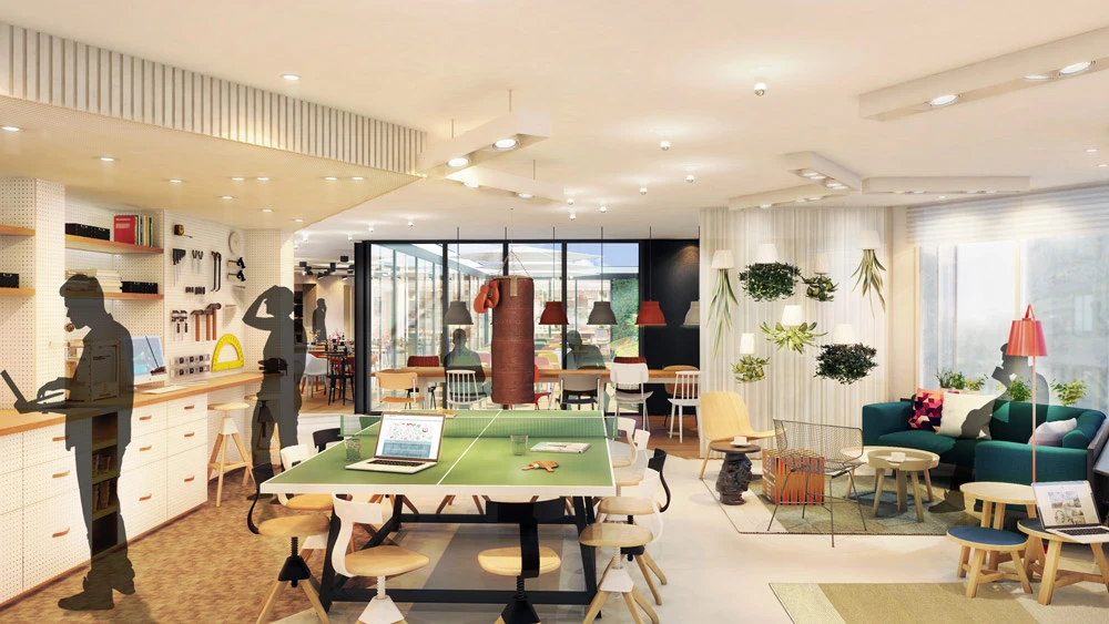 The Zoku communal area has a co-working space with a work table that turns into a Ping-Pong table