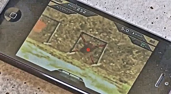TriggerPoint XS1 prototype showing target tag and firing solution with windage correction