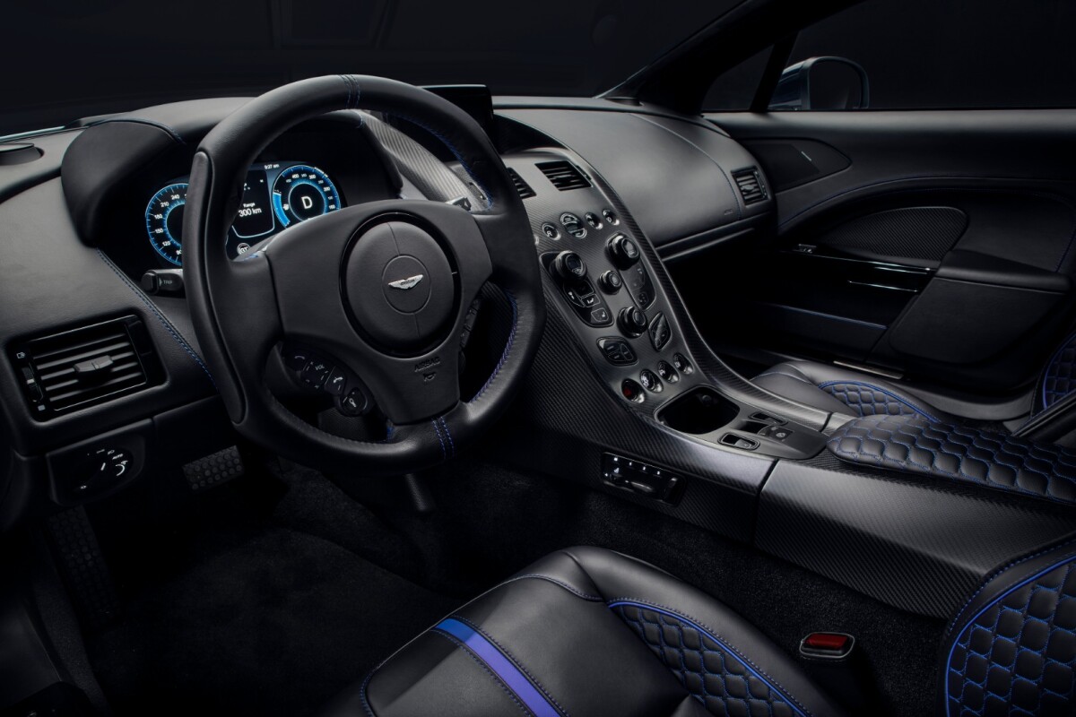The sporty leather interior of the Rapide E. It probably smells terrific