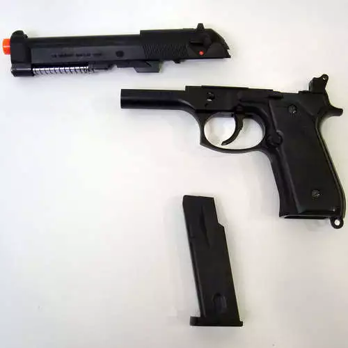 A sharp forward jolt releases the sliding barrel, the magazine clip will become the battery pack