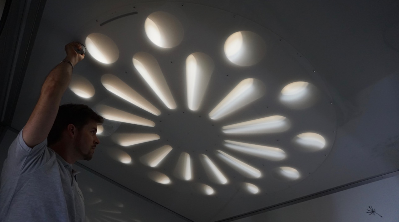 The rose window adjusts from fully open to fully closed, altering the amount of sunlight in the bedroom