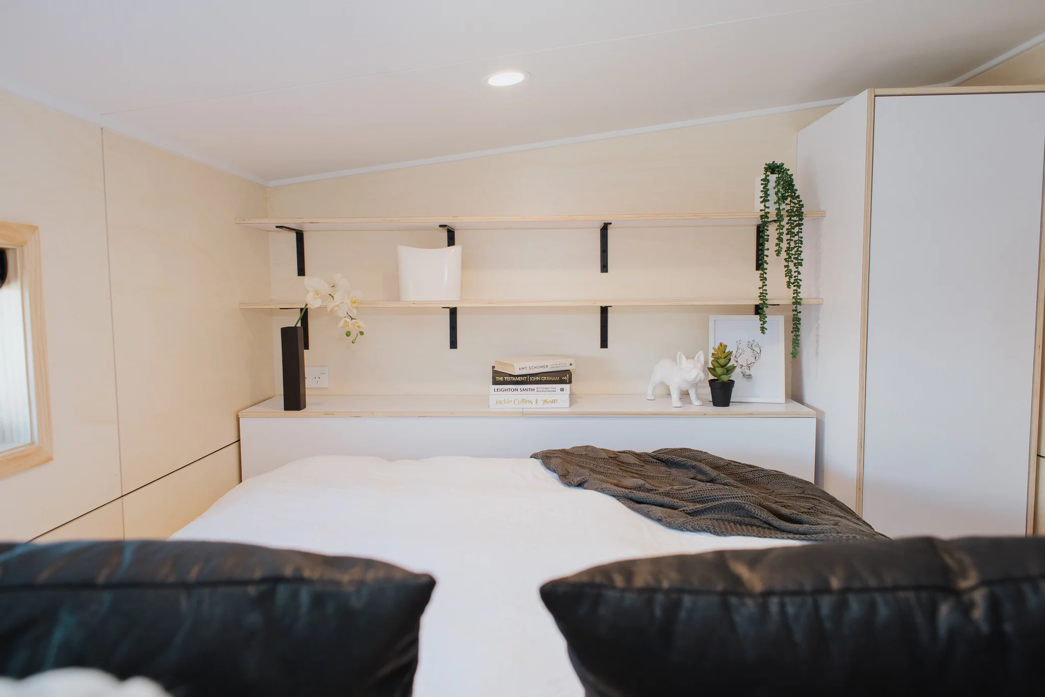 The Dreamweaver Tiny House includes a queen-sized bed