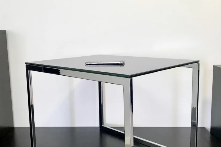 The Ebörd is a table with a surface that can harvest sunlight and wirelessly charge devices