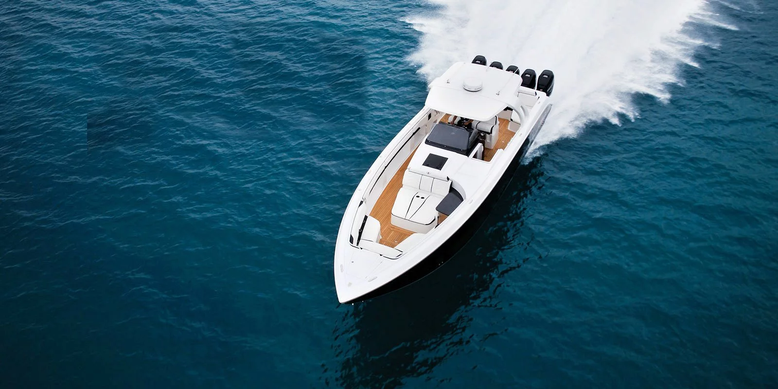 The Huntress' deck has plenty of comfortable seating and lounging areas fore and aft, and the newly designed T-Top provides a bit of protection from the sun