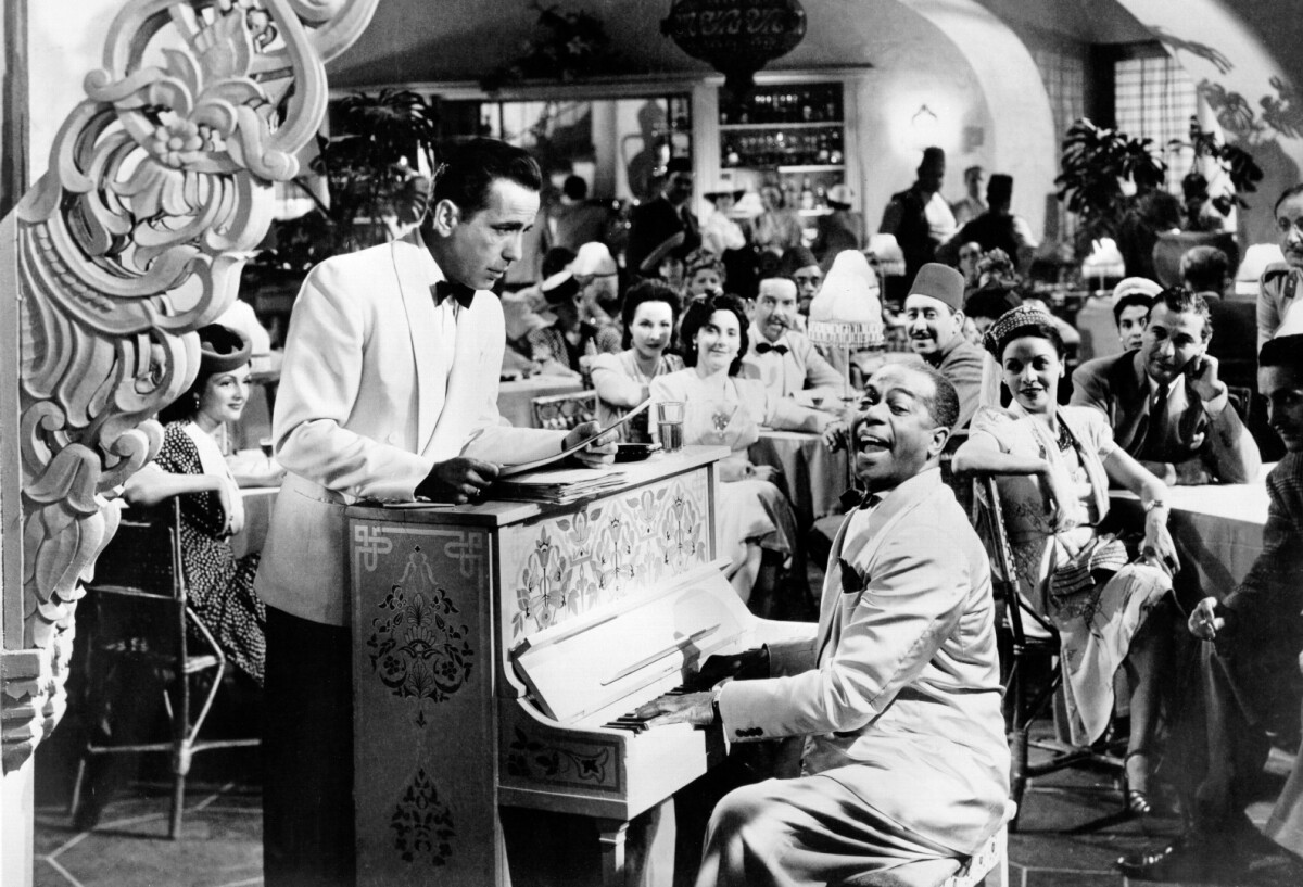 Ricks American cafe in Casablanca. Rick (Humphrey Bogart) and Sam (Dooley Wilson) on piano. The piano sold at auction for $3.4 million a few years back, having been central to the movie and the theme tune of the movie "As Time Goes By" is played upon it after that famous line by Ingrid Bergman, “Play it, Sam” And it has become the stuff of very expensive dreams. It was sold at auction on Monday for $3.4 million, gum and all. The price included a 12 percent commission.
