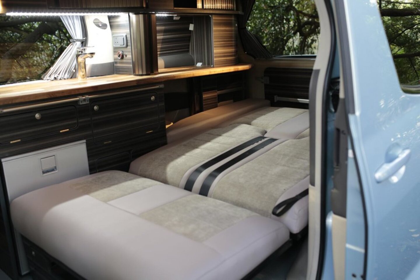 Bifuel hybrid camper van drives 1,000 miles and camps on pure battery