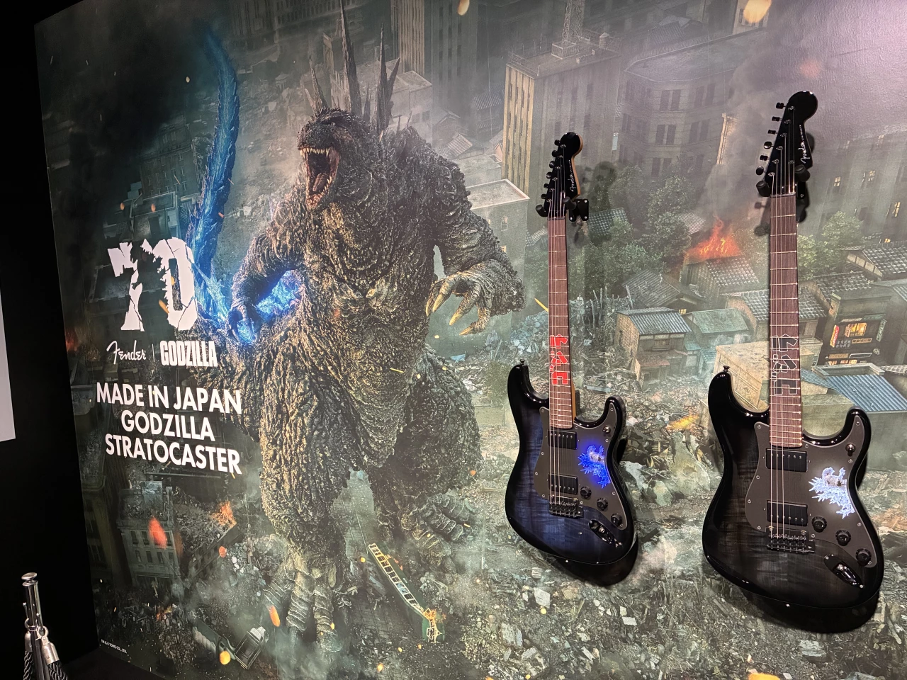 Made In Japan Godzilla Stratocasters, complete with glowing "gain-linked optics" through the pickguards