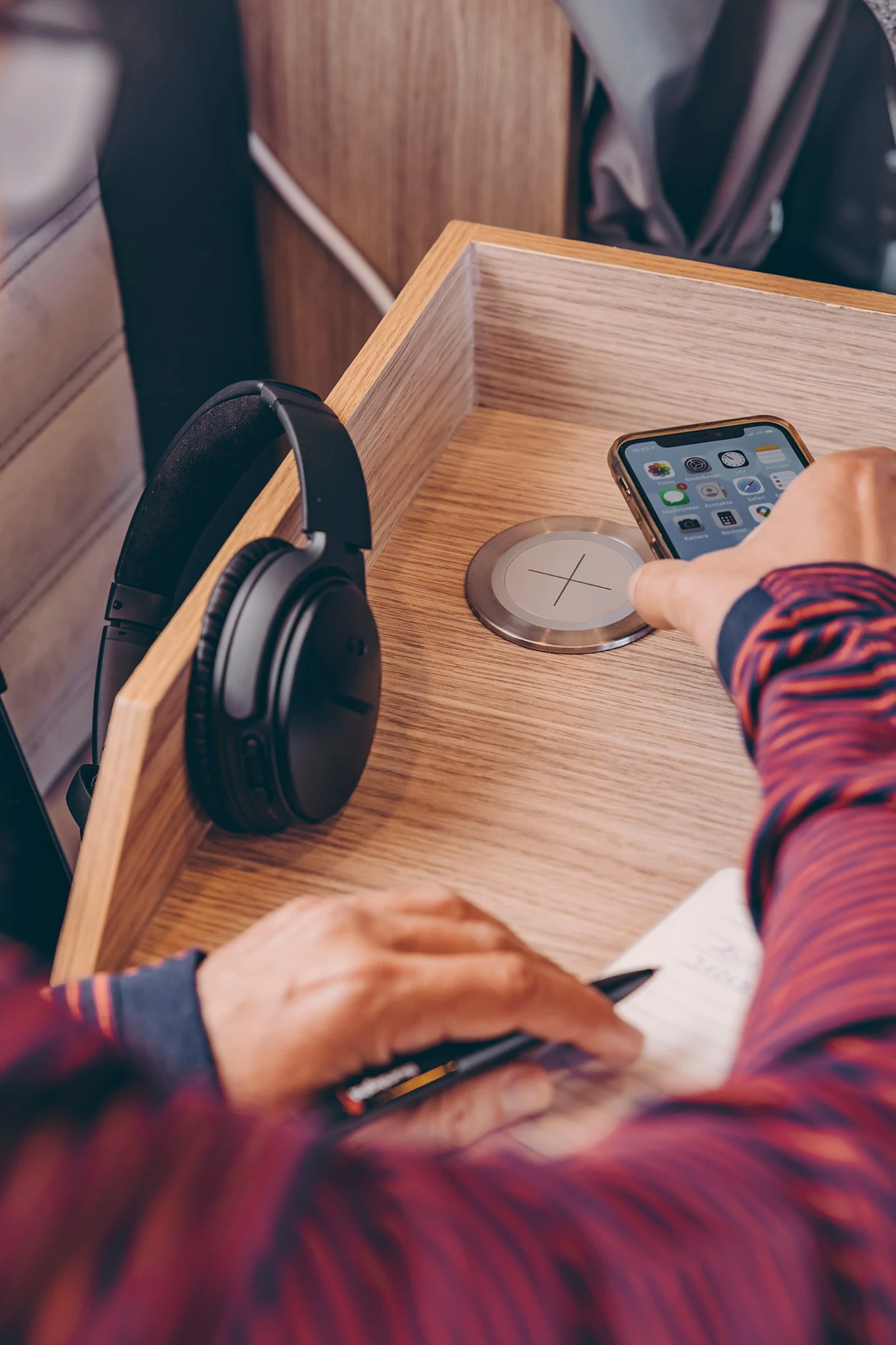 Sunlight's transforming work/dining station includes integrated wireless and hard-wired charging