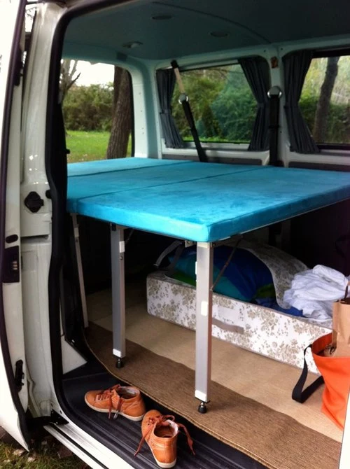 The bed is supported by legs up front