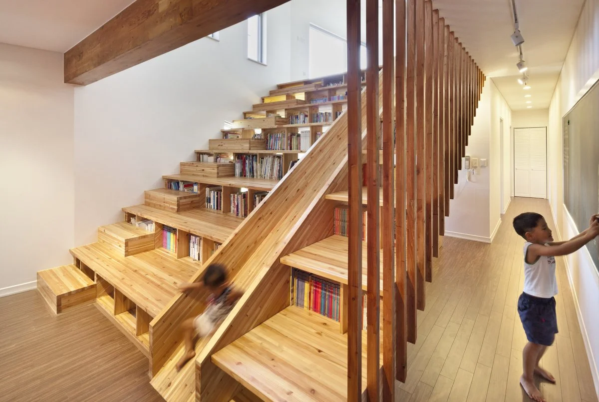 A slide offers a quick and easy way to descend the staircase