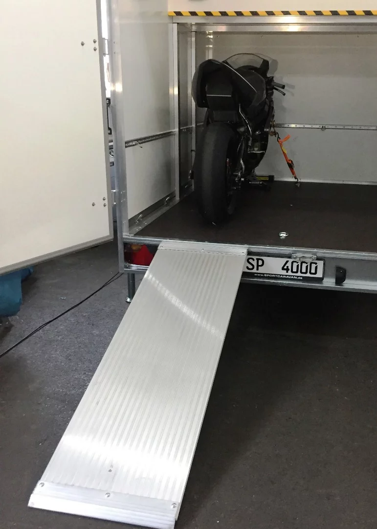 Sportcaravan includes a ramp and offers other loading options