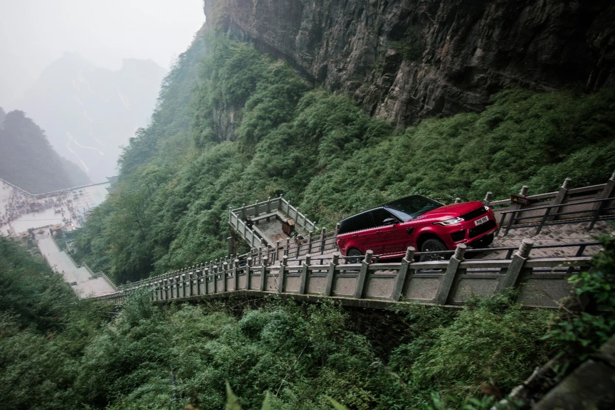 In a stunt unlikely to be repeated, Ho-Pin Tung drives a range rover up the staircase to Heaven's Gate