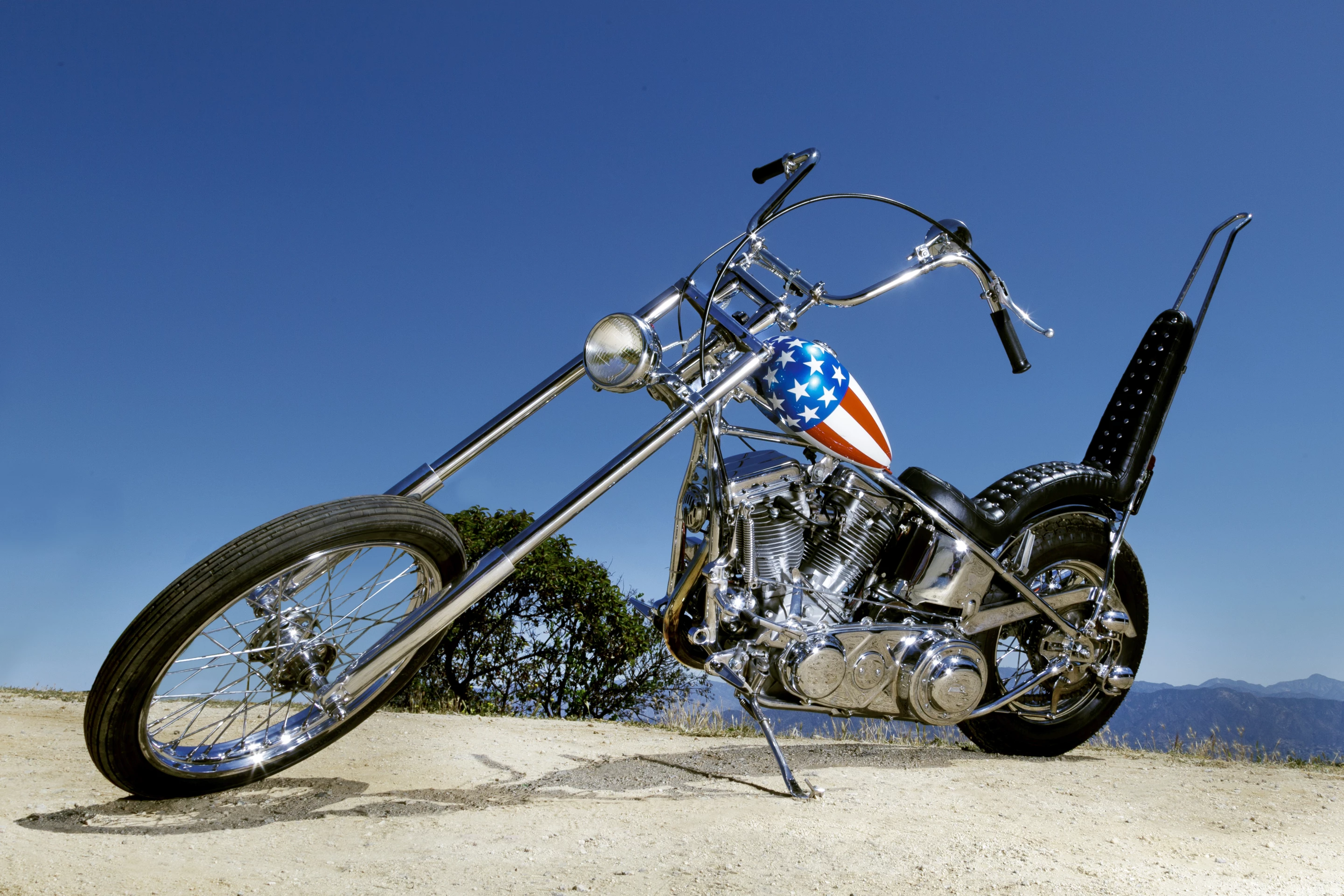 This is the other “Captain America”, sold in 2002 by Dan Haggerty to Midwestern motorcycle parts magnate John Parham. The bike spent many years at the National Motorcycle Museum in Anamosa, Iowa, before Parham sold it to Los Angeles Movie Memorabilia collector Michael Eisenberg in early 2014. Eisenberg took this bike to auction with Profile in History in October 2014, where it hammered for $1.35 million.