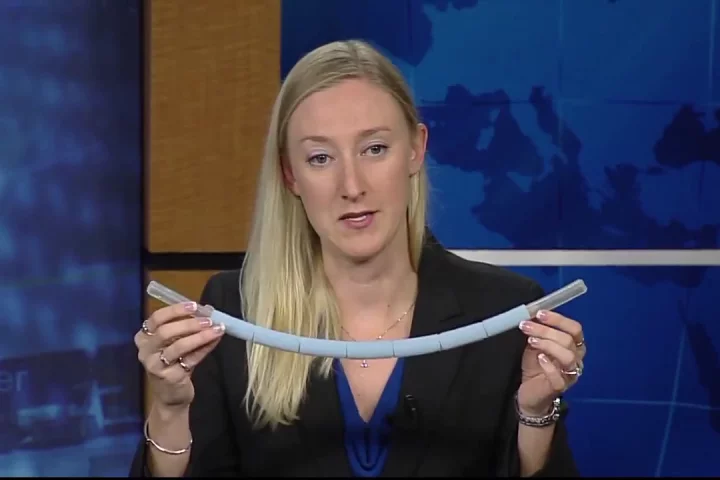 Lead spacewalk officer Allison Bolinger with a prototype of the space snorkel (Photo: NASA)