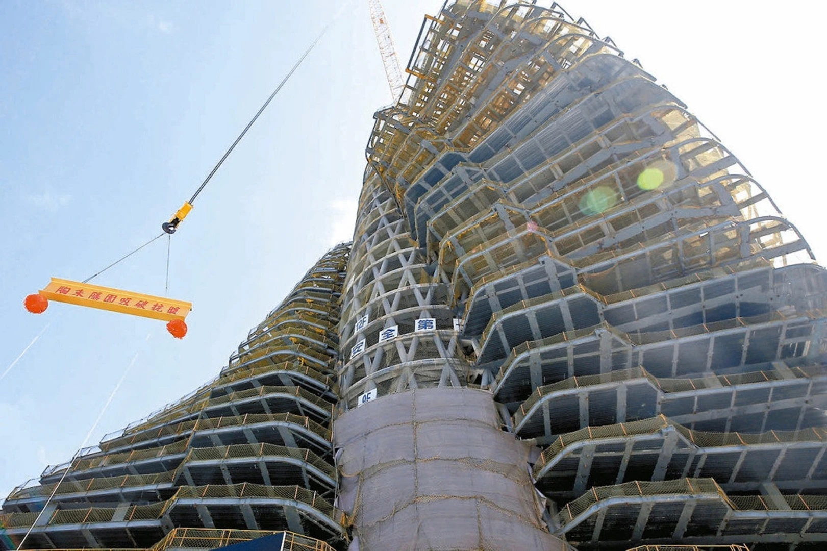 As we reported back in 2013, the Agora Garden Tower takes the form of a double helix