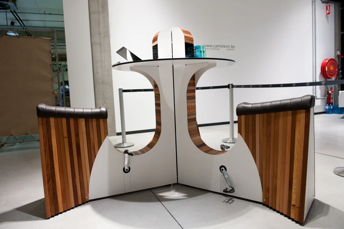 Belgium's We-Watt has created a stylish pedal-to-power pod named WeBike, with three seats around a circular table, each with its own set of pedals that convert gentle cycling action into electricity