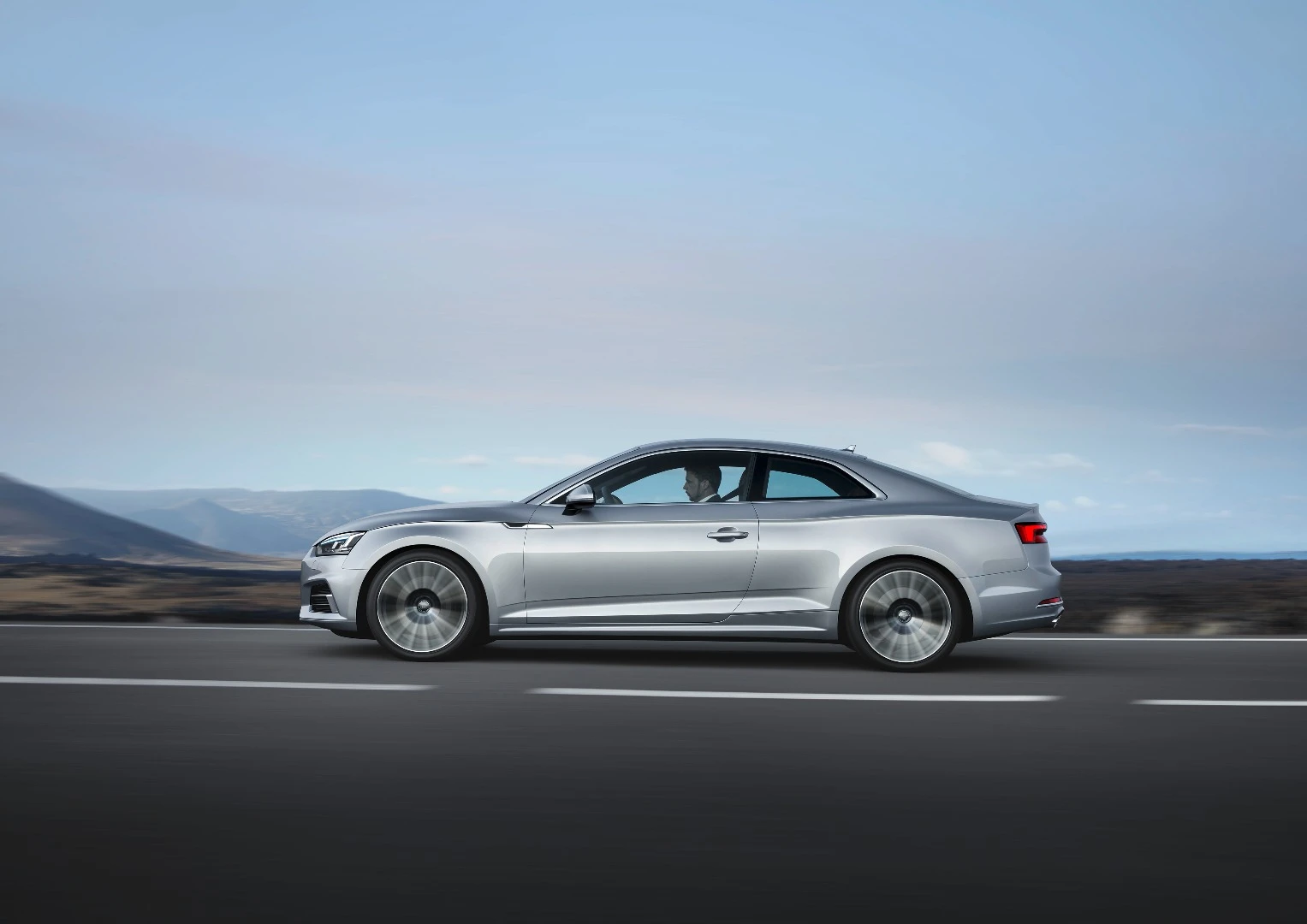 Out go the rear doors, and in their place is a swooping coupe roofline