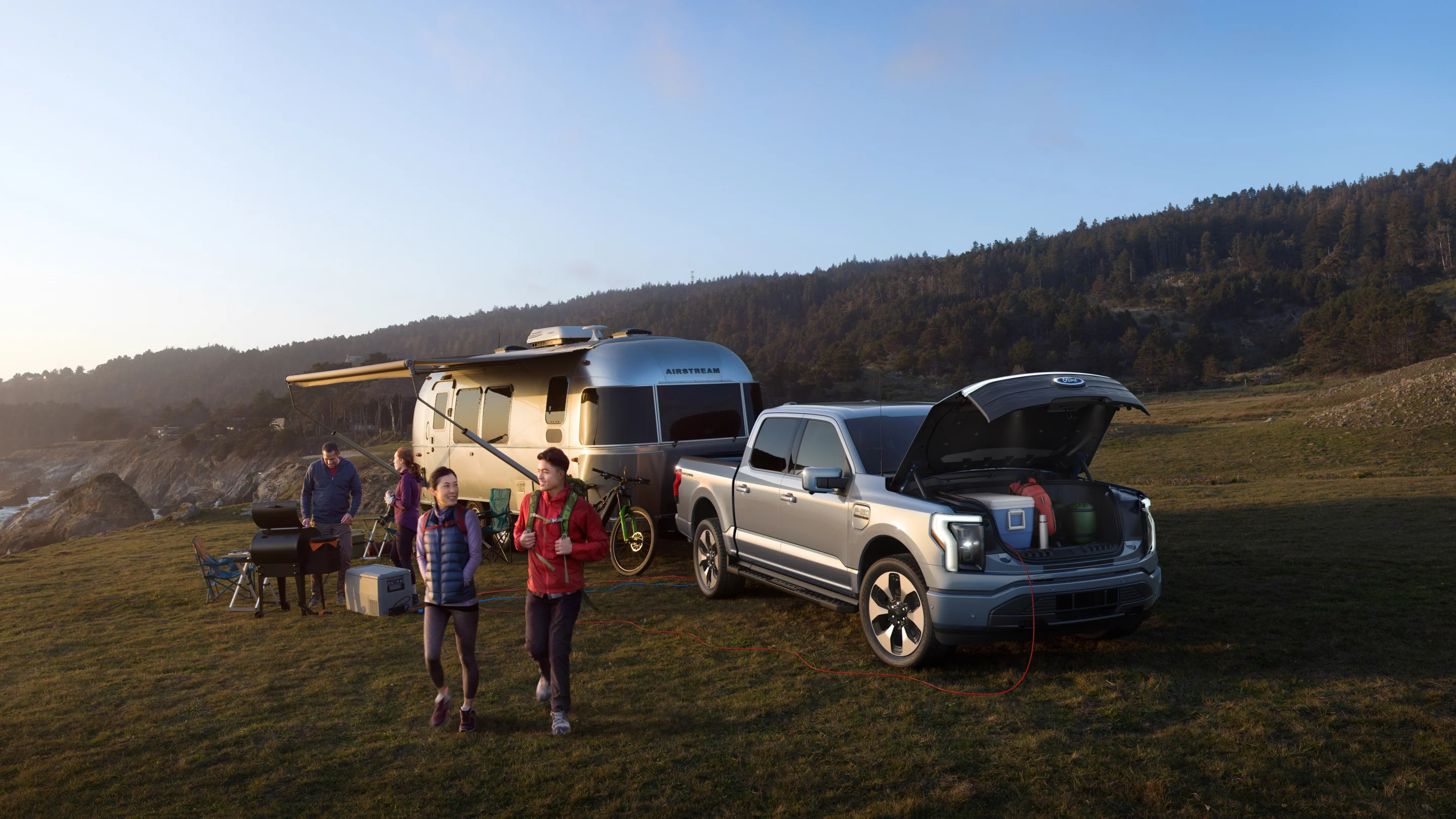 Not only can the F-150 Lightning tow the Airstream to camp, it can power equ