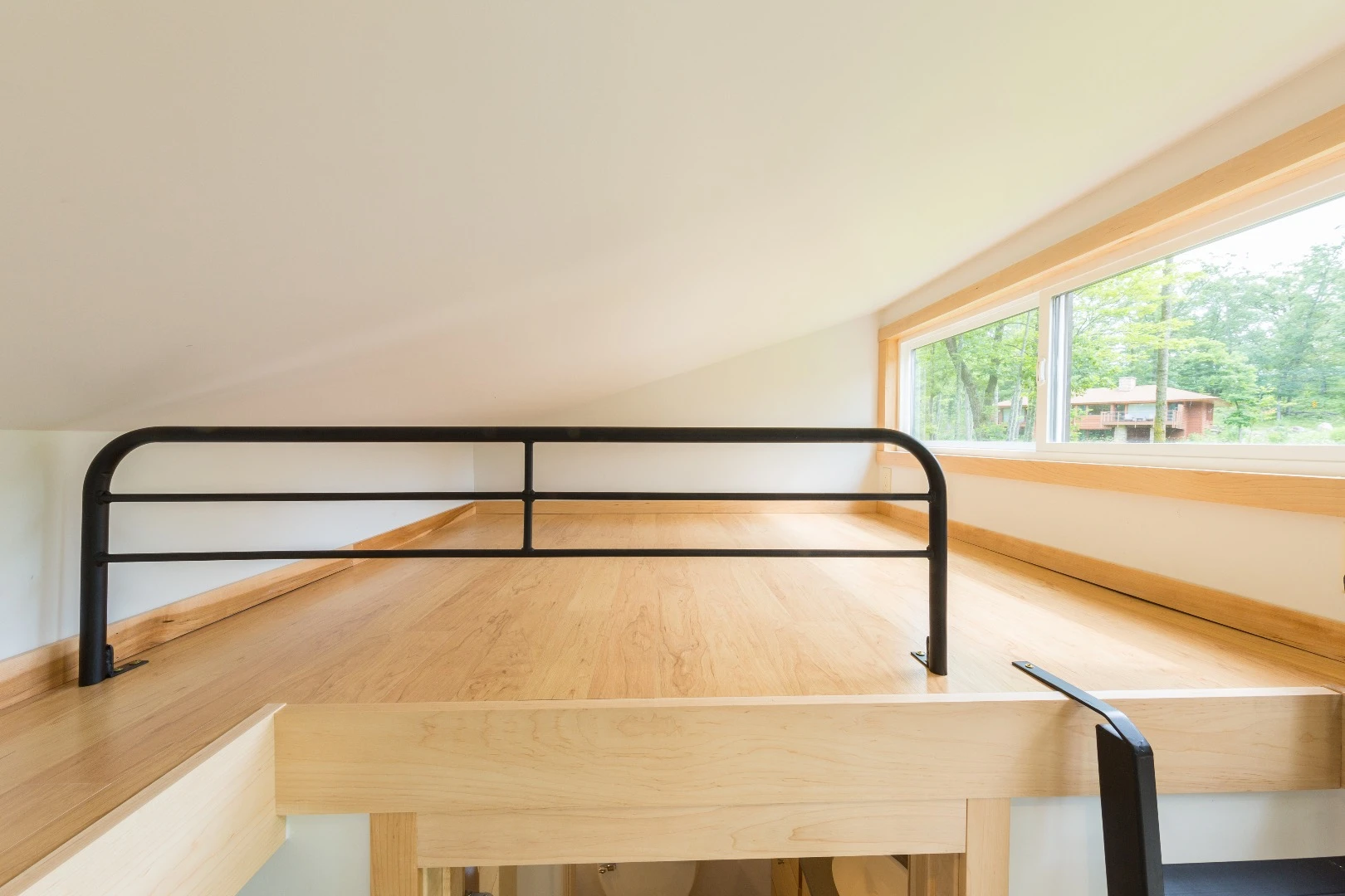The loft bedrooms are accessed via ladder