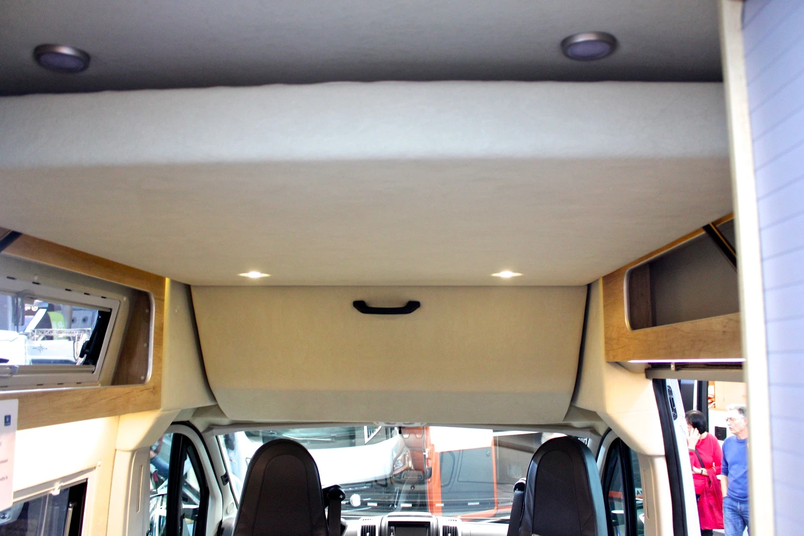 The double bed lifts into the high roof during the day and drops down when it's time to sleep