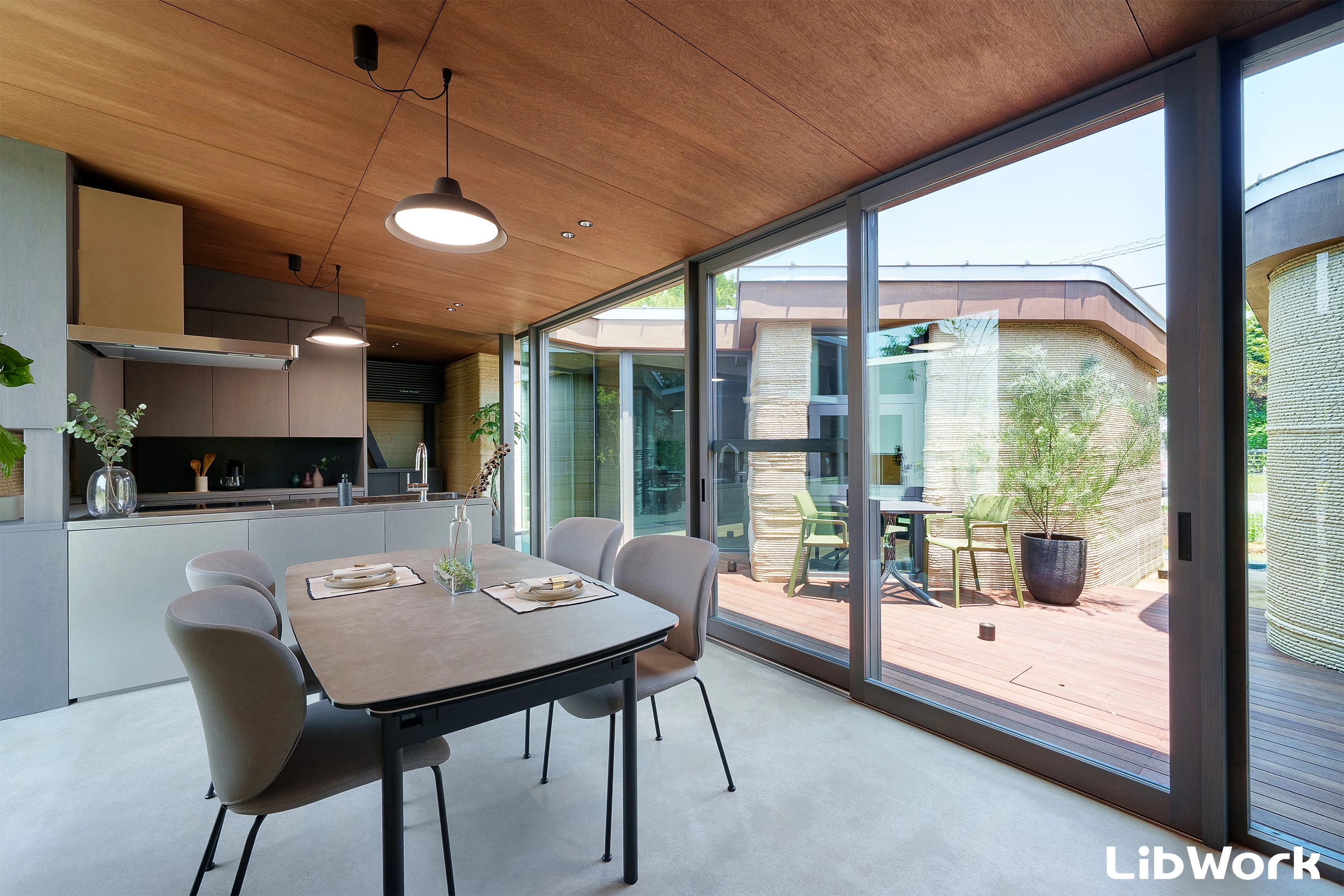 Lib Earth House Model B's interior looks light-filled thanks to its generous glazing