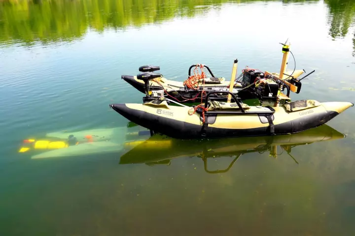 An underwater robot ports with the mobile docking station developed at Purdue University