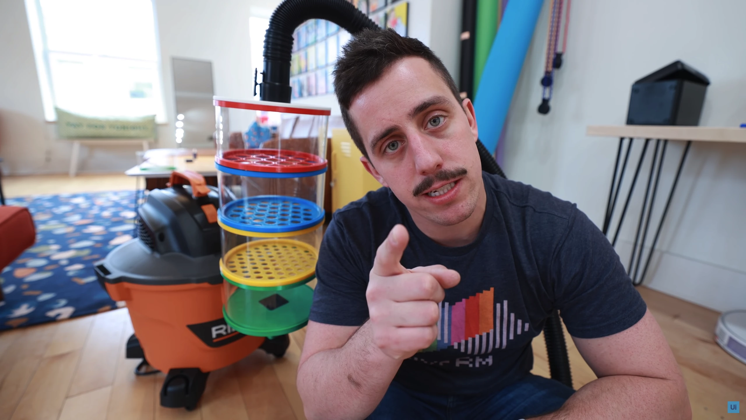 Matty Benedetto with his suck 'n' sort vacuum attachment for Lego lovers