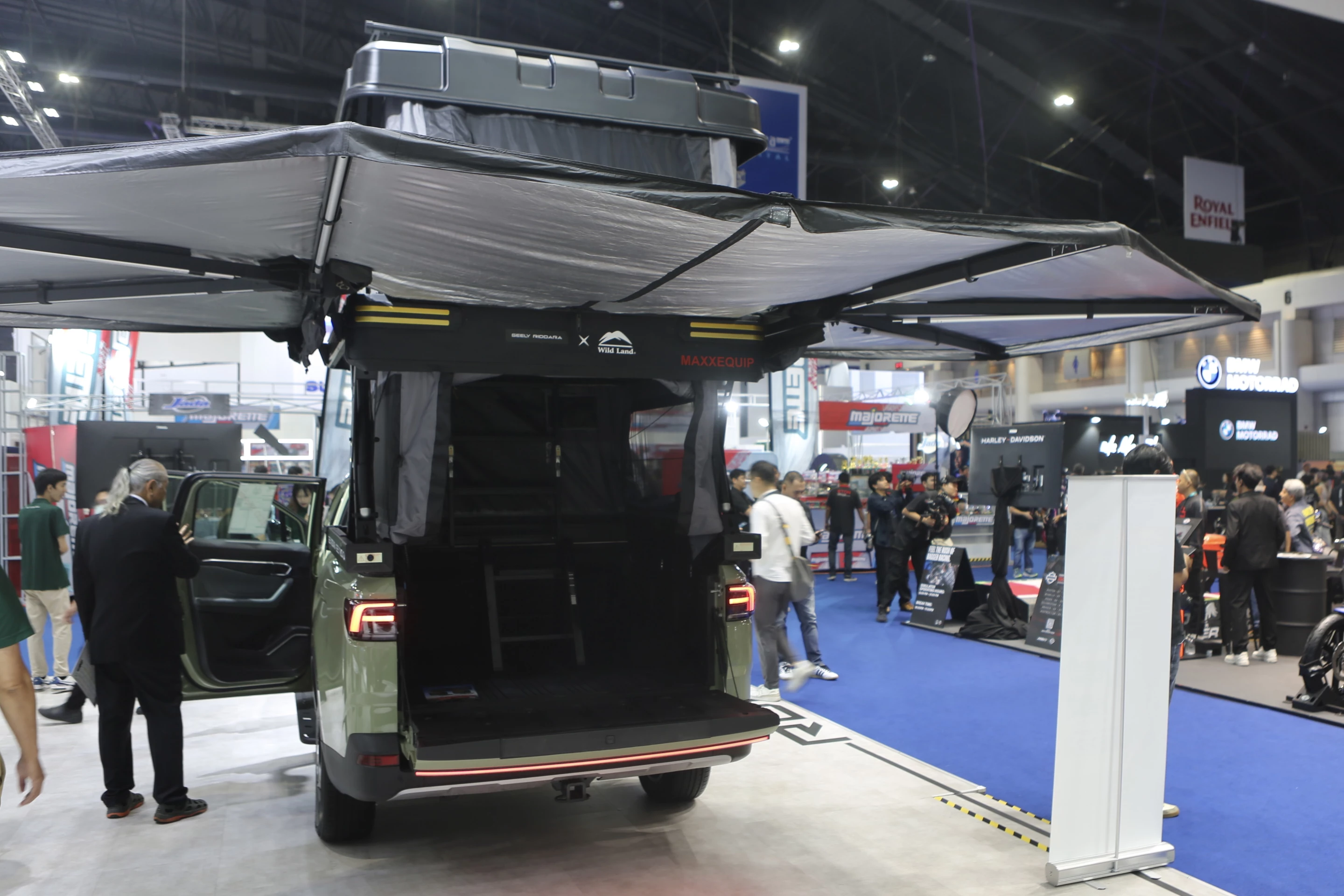 The towering Wild Land Pickup Mate Wingman turns a basic pickup bed into a multi-story campsite