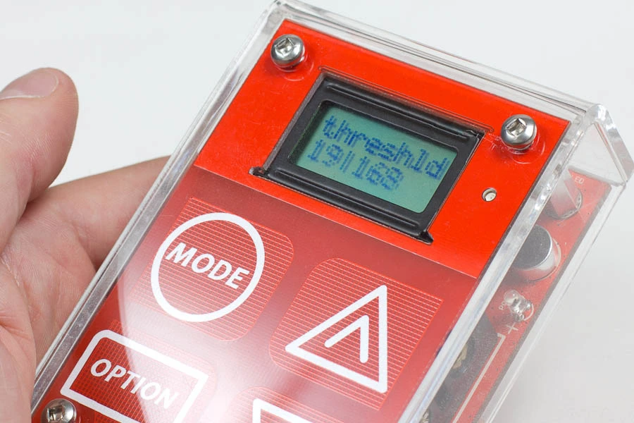 Close-up of the touch-sensitive buttons and LCD display on the front face