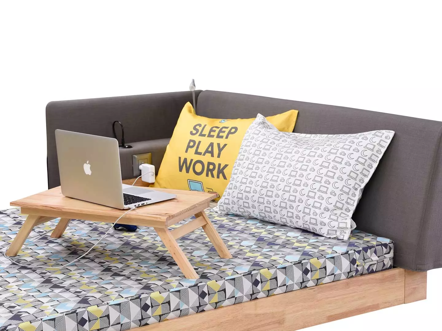 The Pod includes a single bed and mattress, padded headboard and side table corner unit with built-in lamp and gadget charging sockets