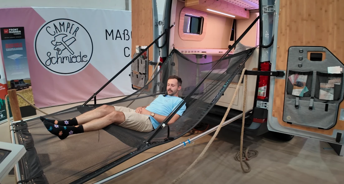Lying out down low in Camper Schmiede's Soul Floater tailgate lounger