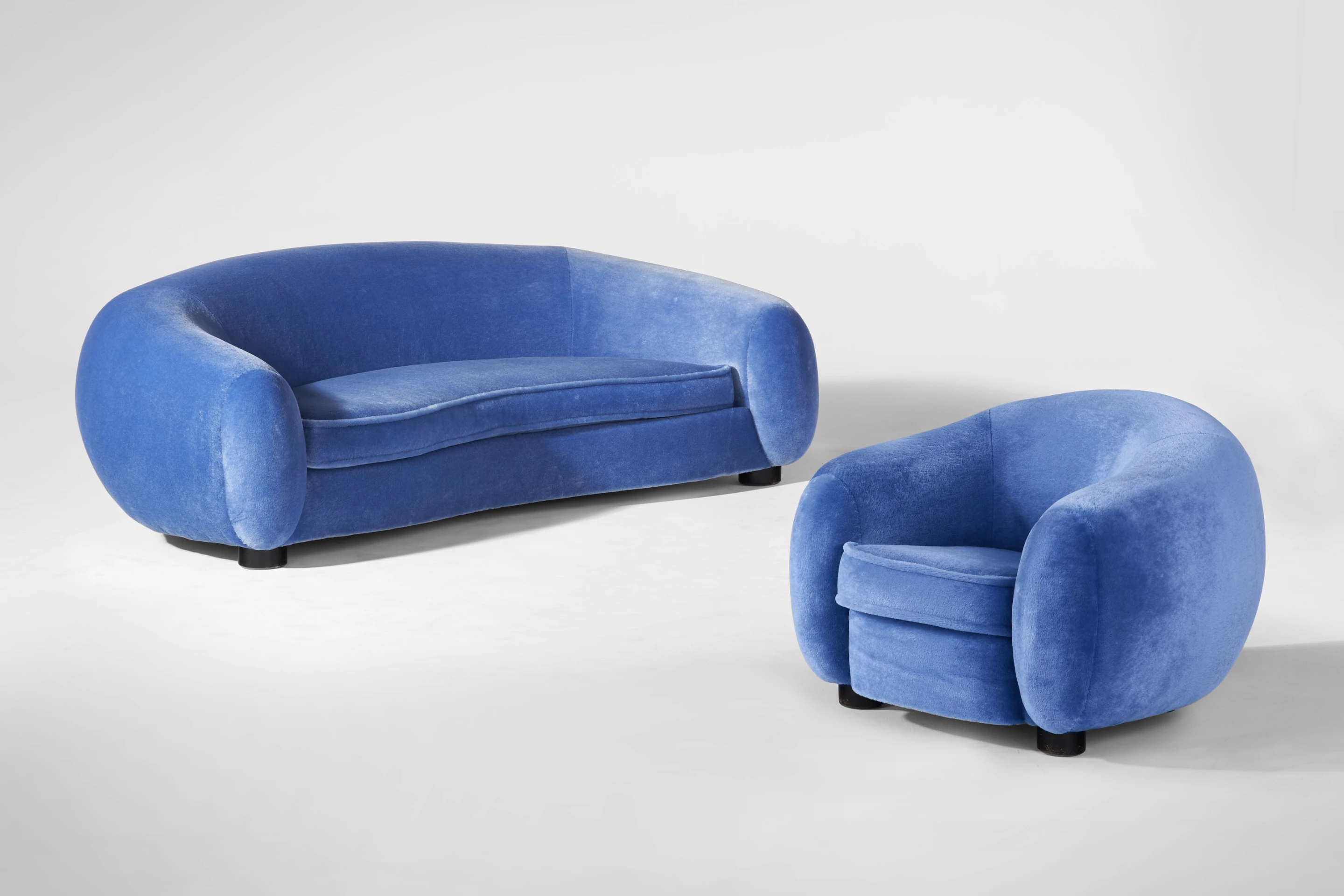 This "Ours Polaire" sofa and armchair (Circa 1950) by Jean Royère sold for $1,110,000 at Christie's on 9 December 2021