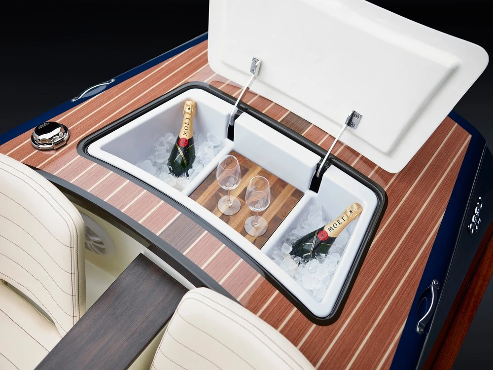The boats come with a food and drink cooler incorporated into the contours of the boat