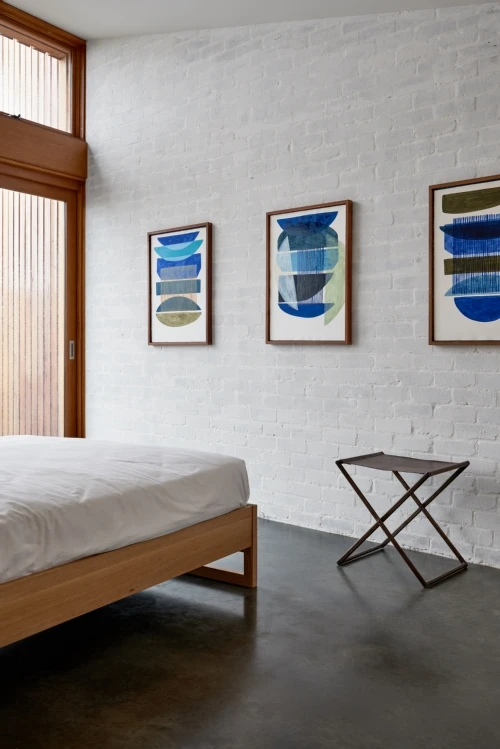 The architects chose to furnish the home with local and sustainable Australian products, including organic cotton mattresses and bedding