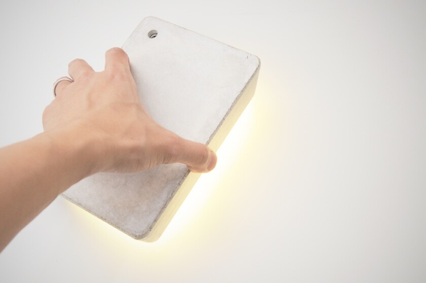 Brick Lamp is designed to be tactile, as lifting it acts as the On/Off switch