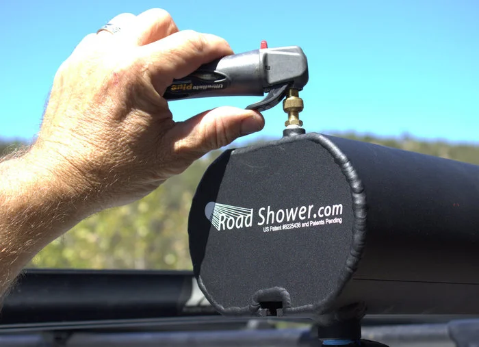 A CO2 cartridge or bike pump is used to pressurize the tank