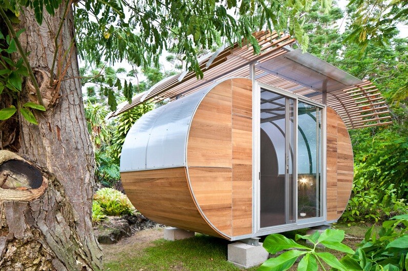 Once constructed, the House Arc features large windows that allow natural light to filter through the dwelling