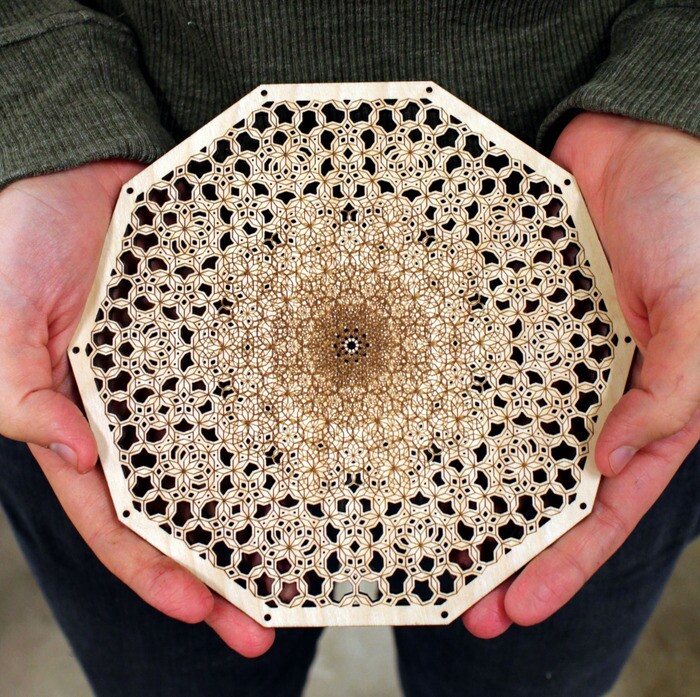 A sample of the Origami's work shining a powerful light on wood