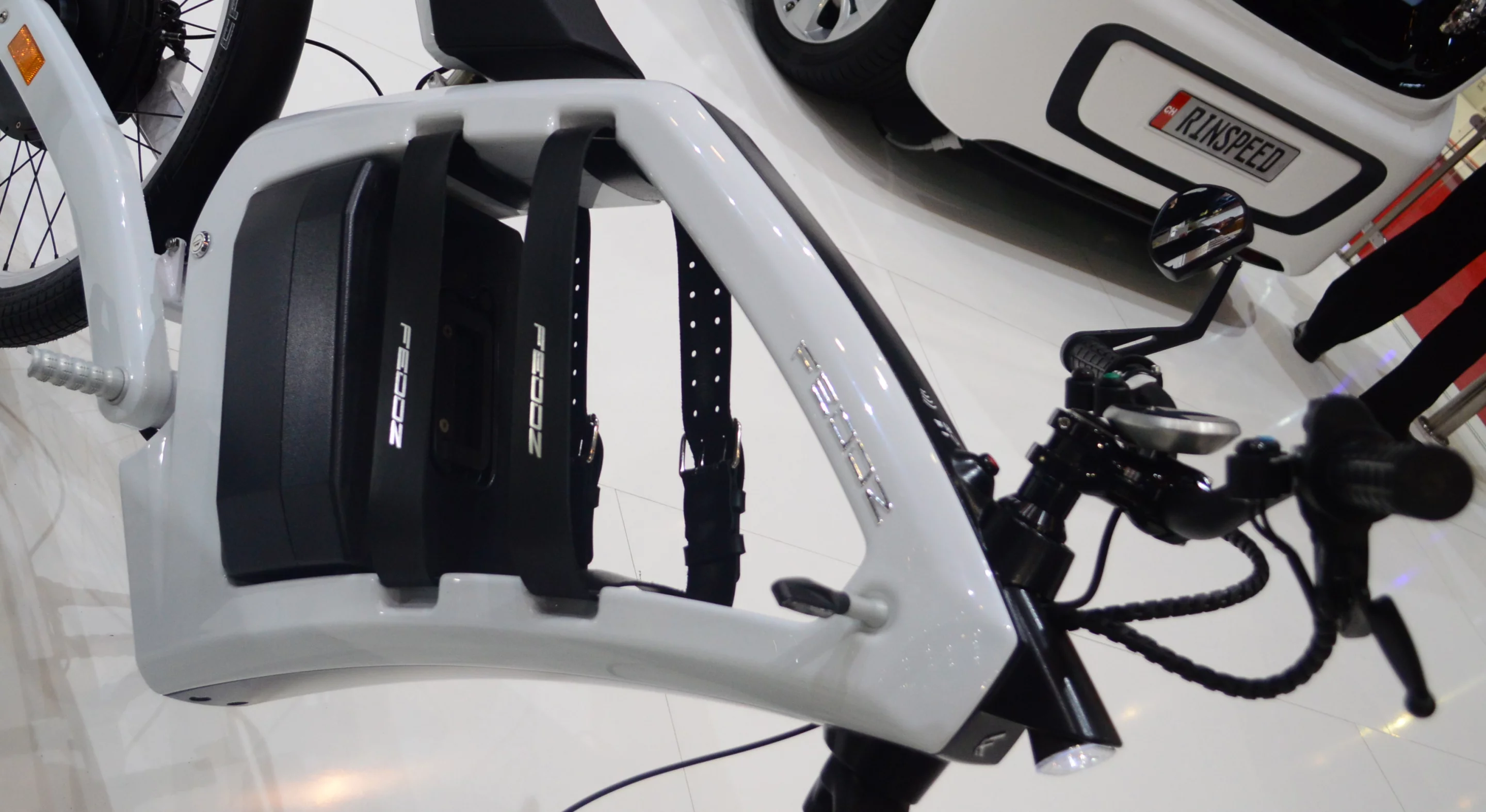 Two straps keep the rider's load in place