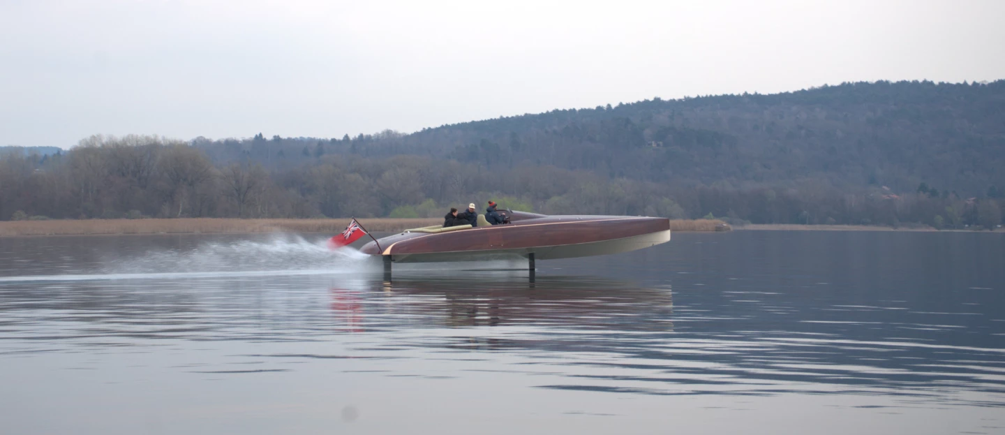 Lifting the hull out of the water reduces drag by as much as 75%, greatly extending range