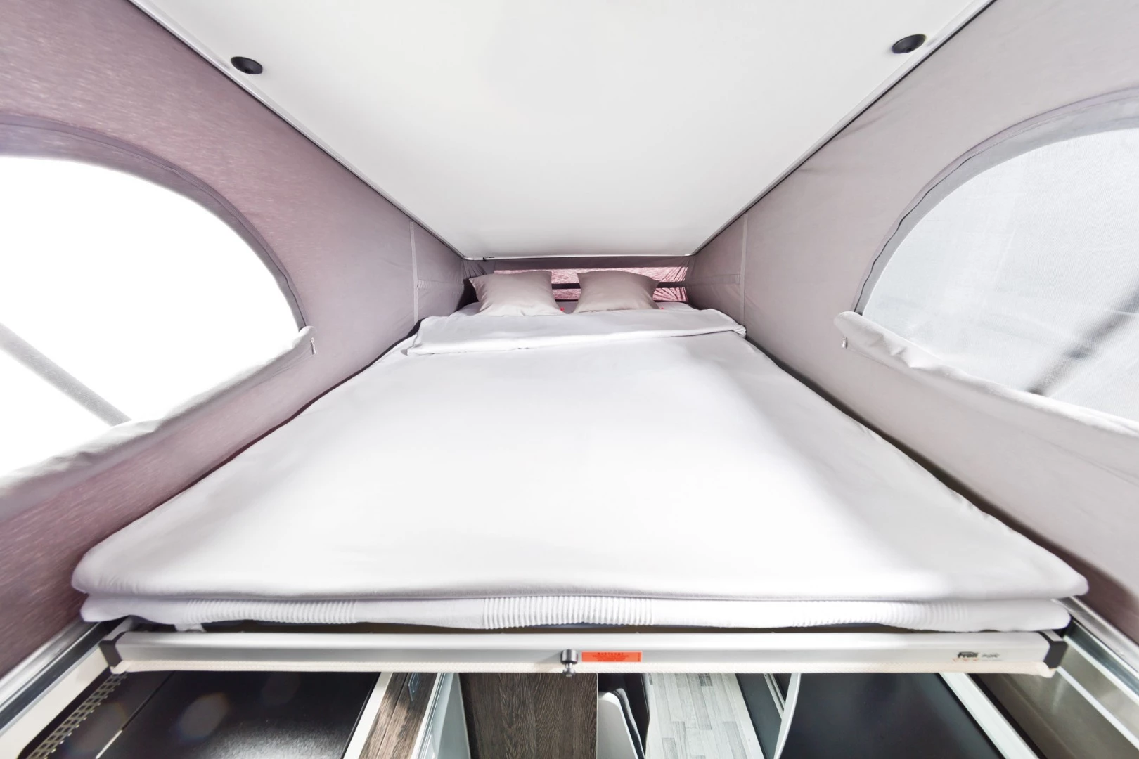 The Westfalia Club Joker City keeps things more compact on the streets by relying on a pop-up roof with bed