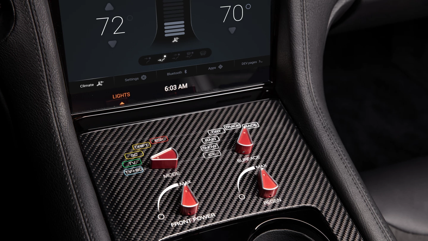 Drivers can tweak the powertrain with old-school dials