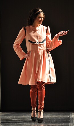 The solar coat that can charge cell phones, iPods and MP3 players was designed by Abbey Liebman of Cornell University(Credit: Mark Vorreuter)