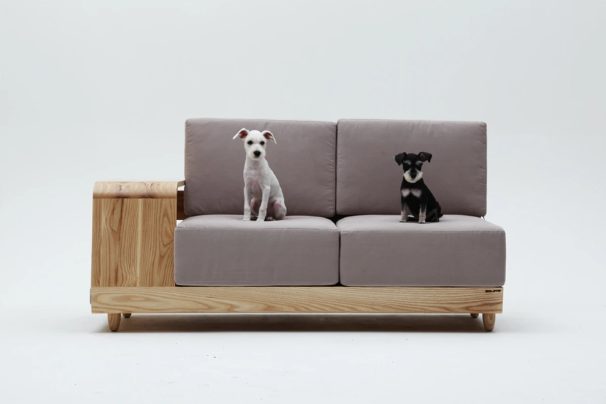 South Korean designer Seungji Mun has continued his trend of animal friendly furniture with a Dog House Sofa