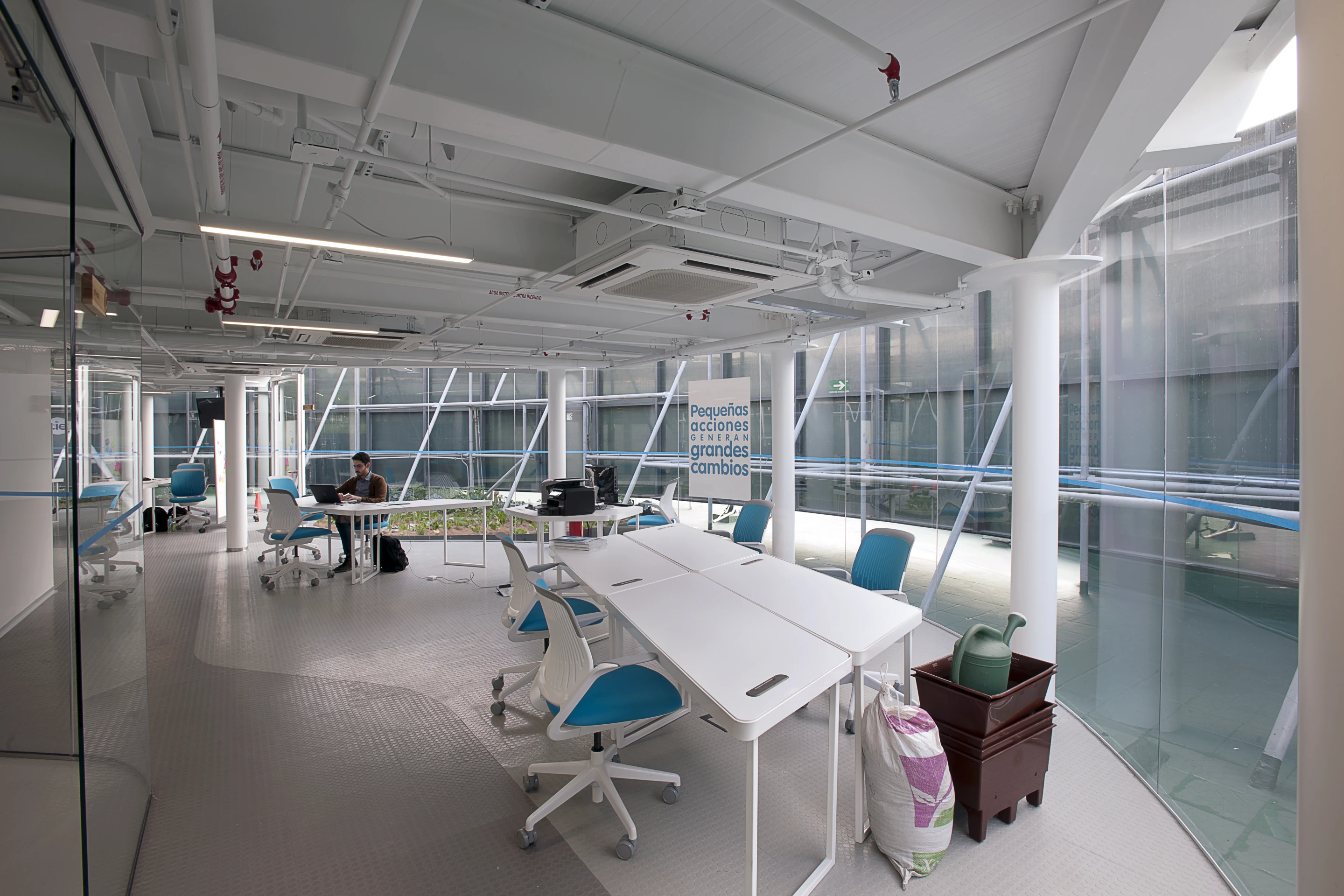 The designers built an open office space filled with locally-made furniture that's designed to be easily rearranged into different configurations (Credit: Jaime Navarro; Courtesy Rojkind Arquitectos)