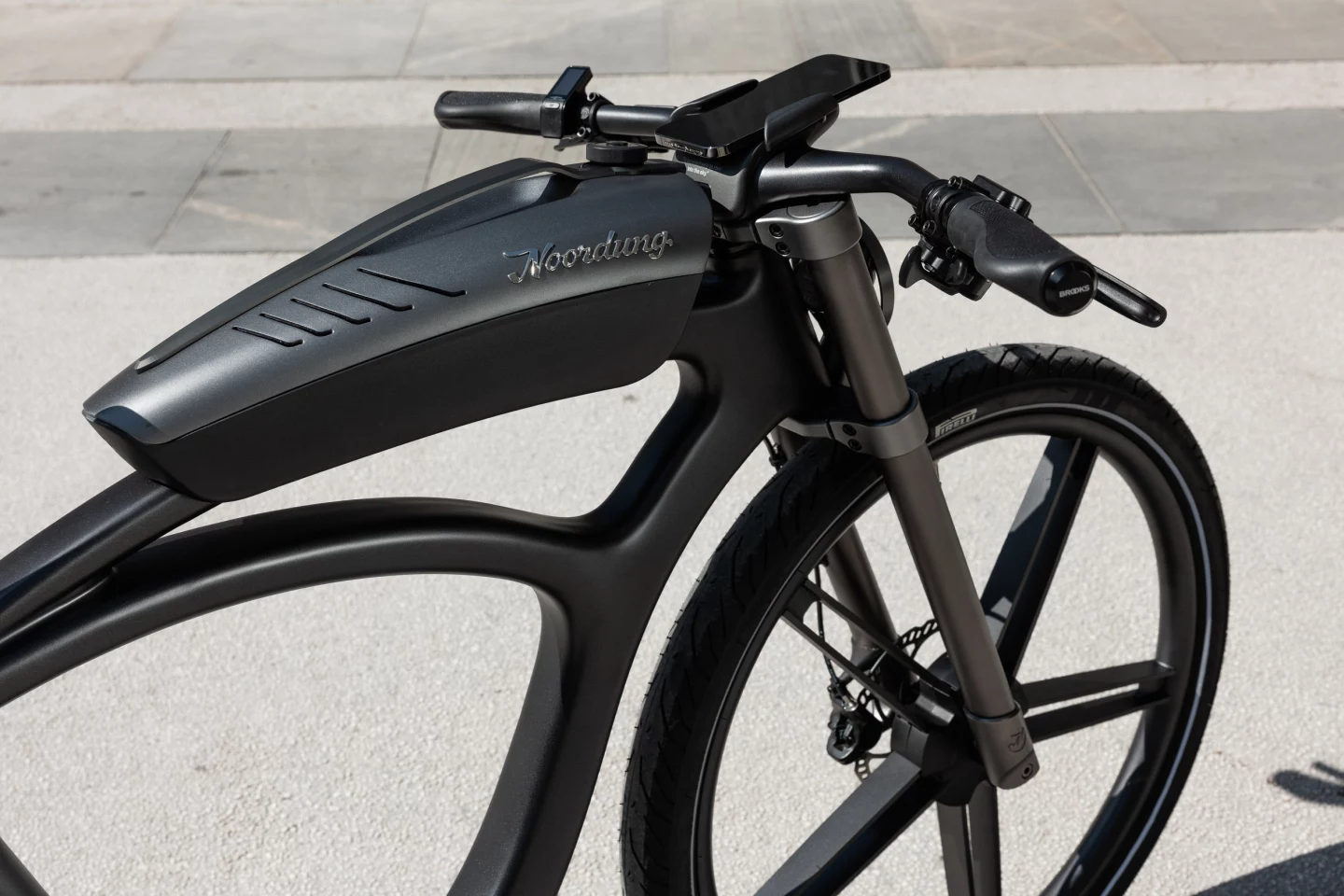 The battery pack within the removable Boombox "fuel tank" is reported good for up to 60 km of motor-assisted riding per charge