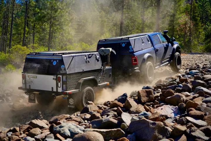 With its military-derived bones and collapsible living space, the Multicamp trailer rides to its destination as a compact, ultra-rugged towable