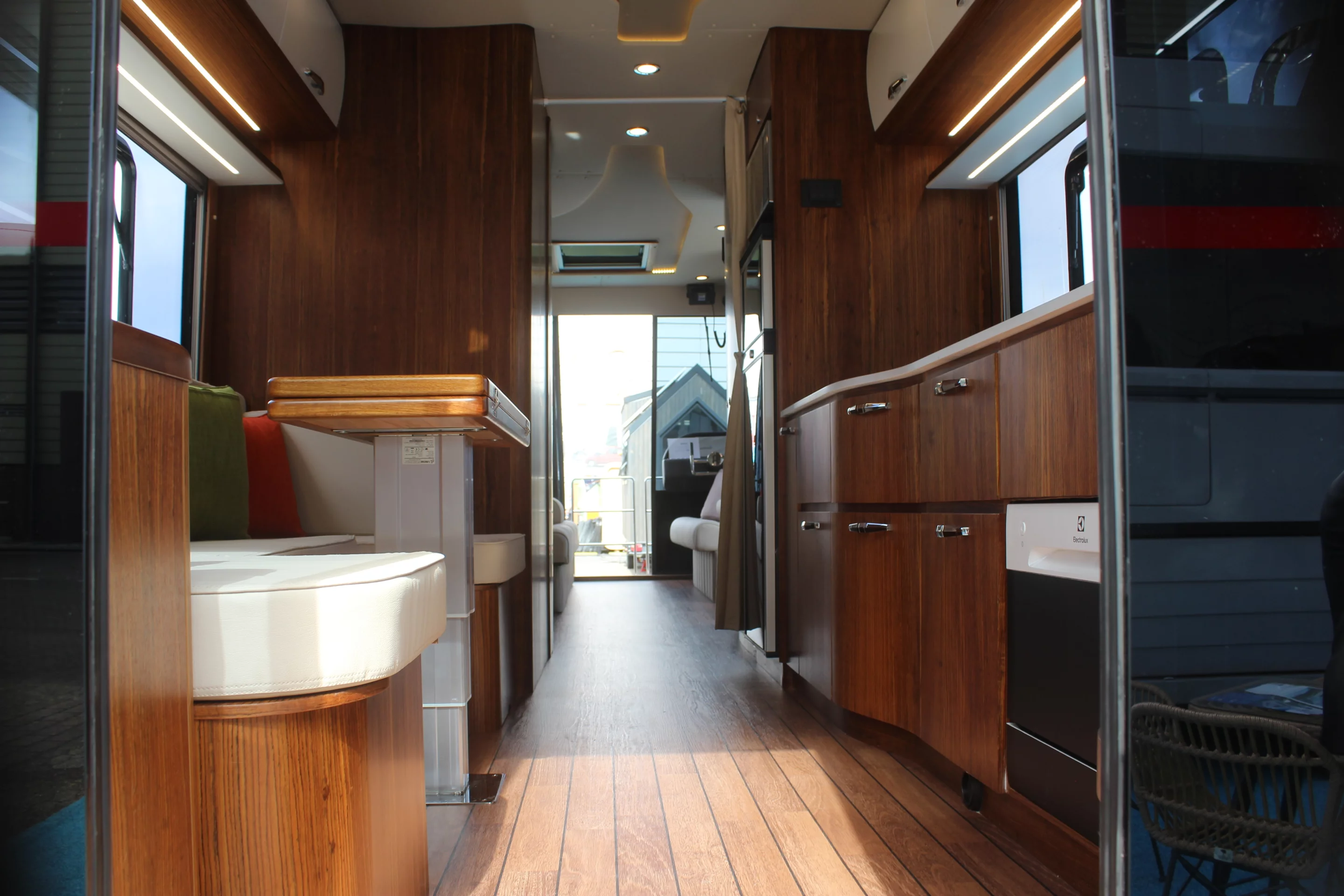 The aft cabin of the Caracat houses a sofa lounge and the galley