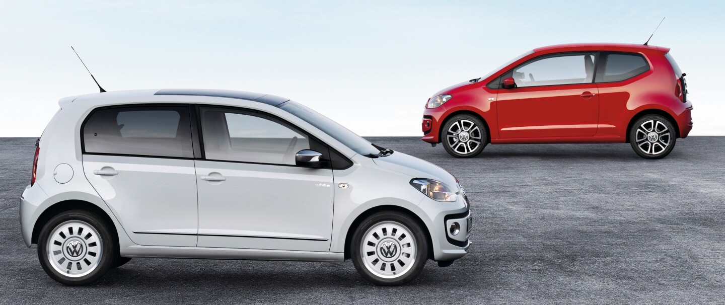 The new five-door up! (front) and the two-door model